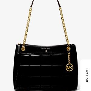 • Quilted 
• 100% leather 
• Gold-tone hardware
• 14"W X 9.5"H X 5.5"D